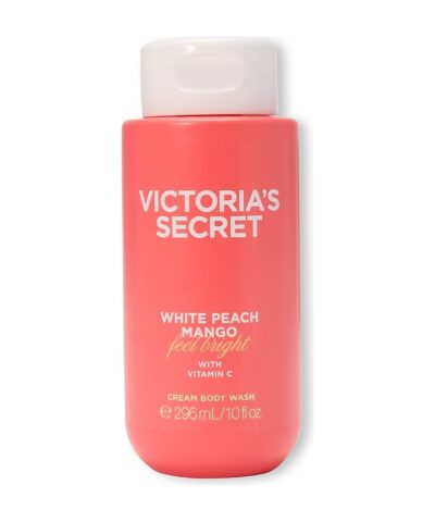 Victoria's Secret White Peach Mango Cream Body Wash 296 ml koralinis buteliukas su baltu dangteliu baltame fone