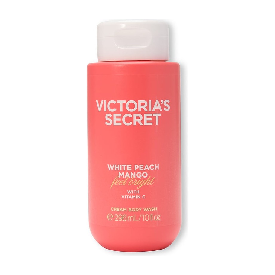 Victoria's Secret White Peach Mango Cream Body Wash 296 ml koralinis buteliukas su baltu dangteliu baltame fone