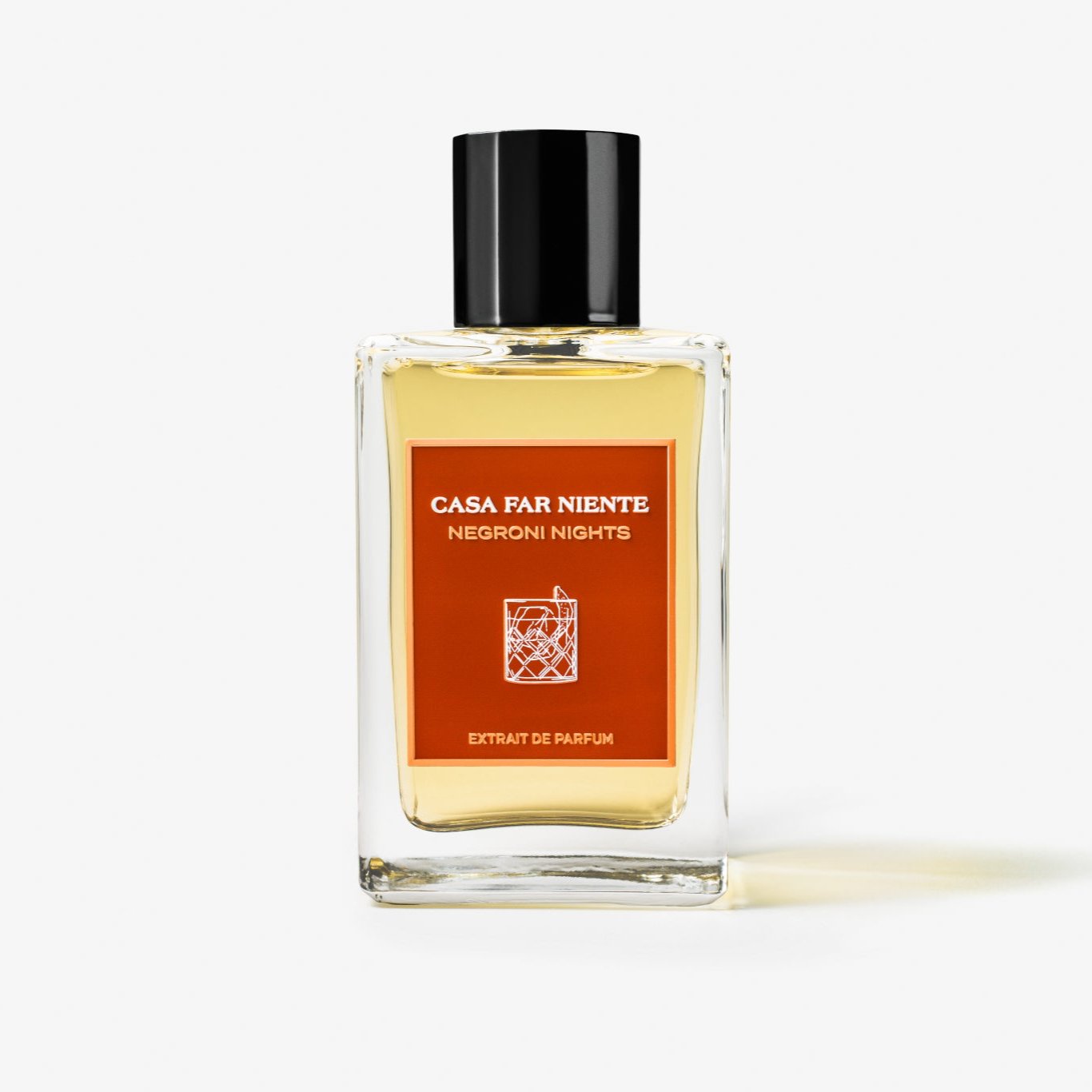 Casa Far Niente Negroni Nights Extrait de Parfum 100 ml, skaidrus buteliukas su plytine oranžine etikete ir juodu dangteliu